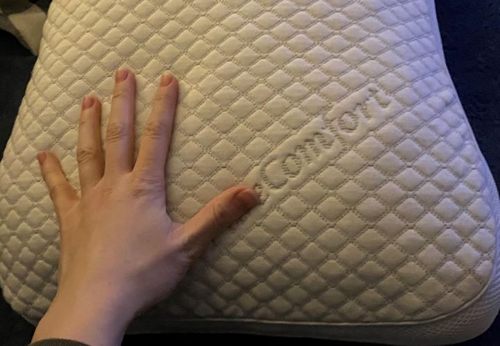  Reviewing the fabric of the PureComfort shoulder relief pillow if it's hypoallergenic and resists dust mites
